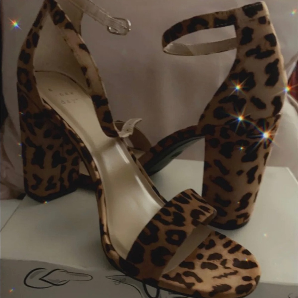 Brand new never worn cute brown heels. Size is 8.5 Wide.